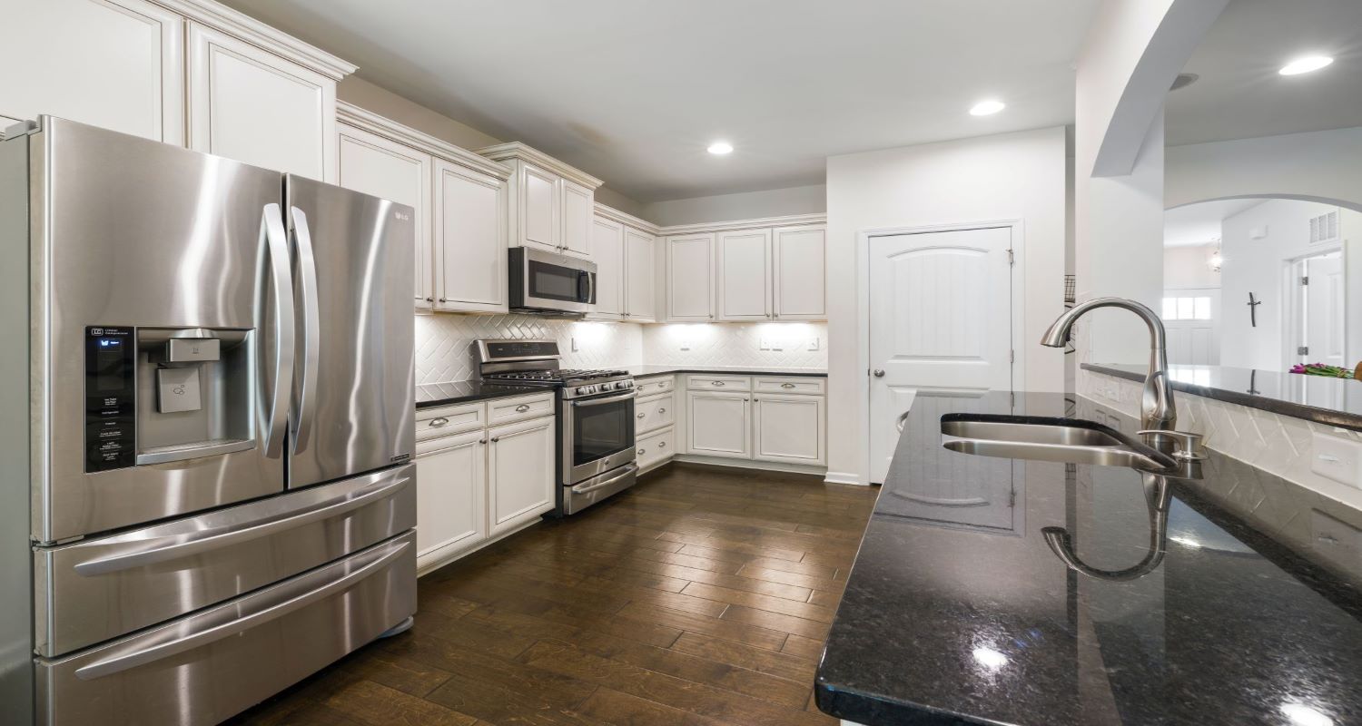 After - brown and white kitchen